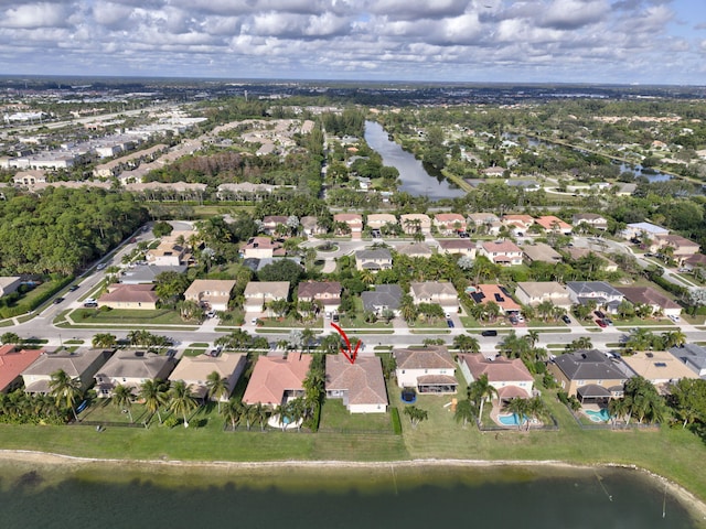 bird's eye view with a water view