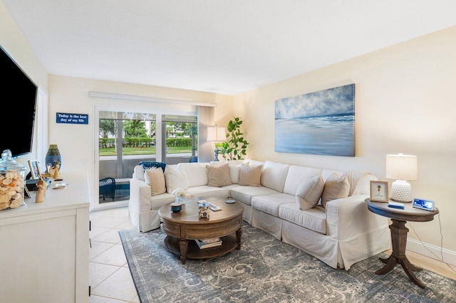 living room with light tile patterned floors