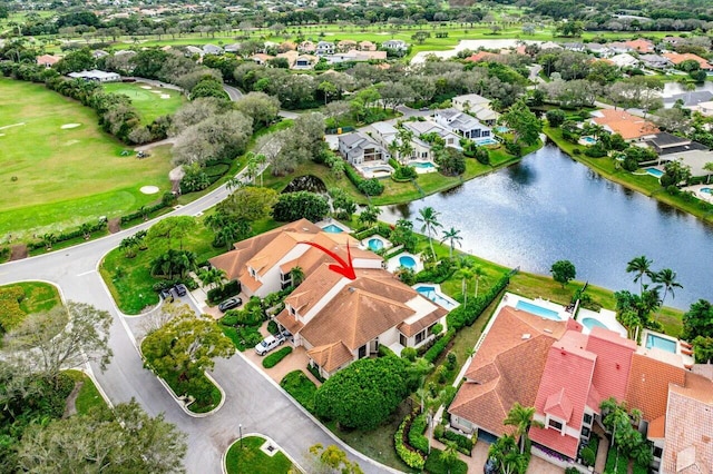 birds eye view of property featuring a water view