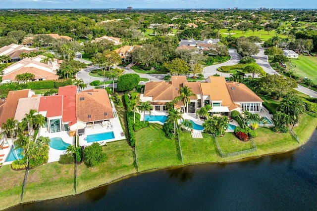 birds eye view of property featuring a water view