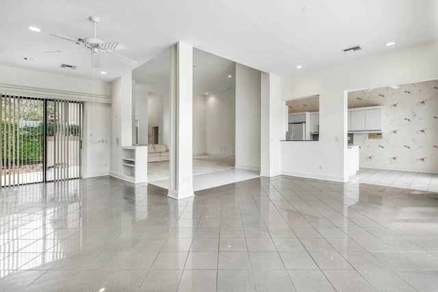 interior space featuring ceiling fan