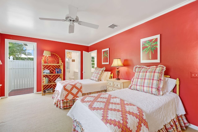 bedroom with ensuite bath, crown molding, ceiling fan, carpet flooring, and access to exterior