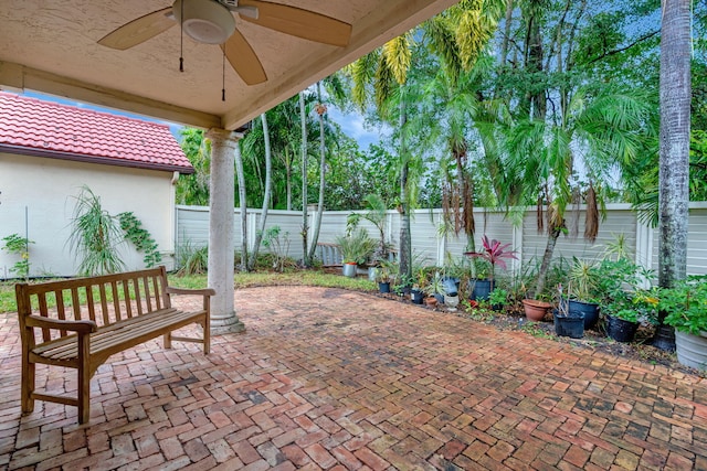 view of patio / terrace featuring ceiling fan