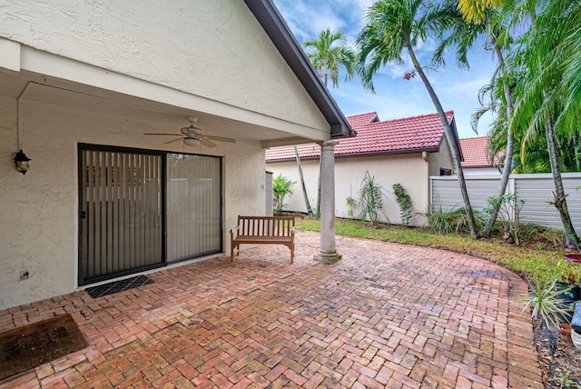 view of patio / terrace featuring ceiling fan