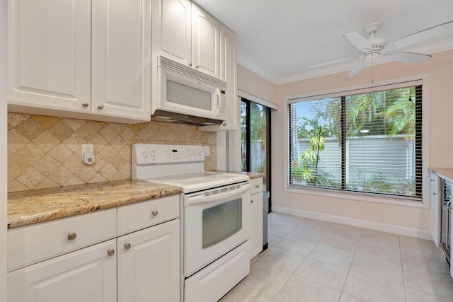 kitchen featuring white appliances, decorative backsplash, white cabinets, and ornamental molding