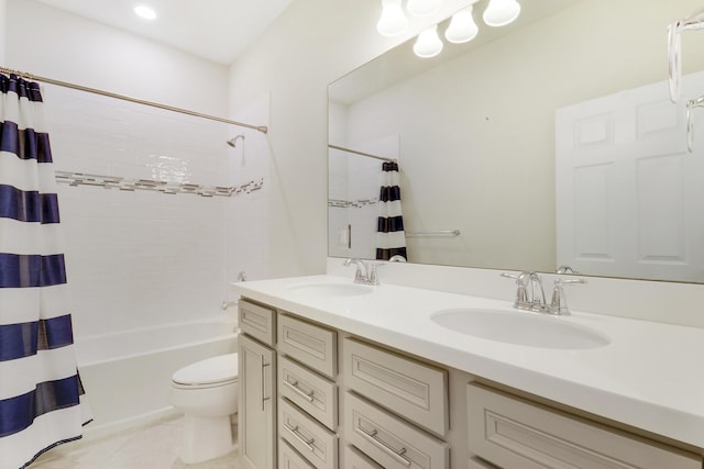 full bathroom with tile patterned flooring, shower / bath combo, vanity, and toilet