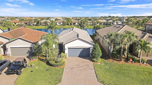 drone / aerial view with a water view