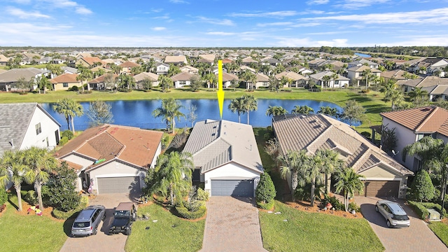 drone / aerial view with a water view