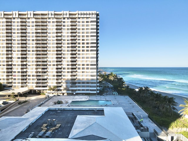 view of building exterior with a water view