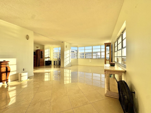 tiled living room with a textured ceiling