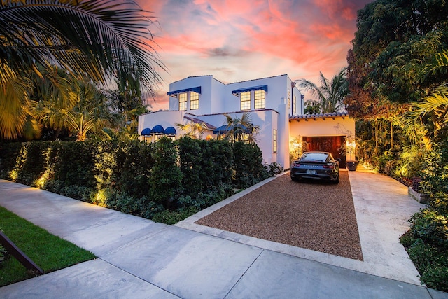 view of front of property featuring a garage