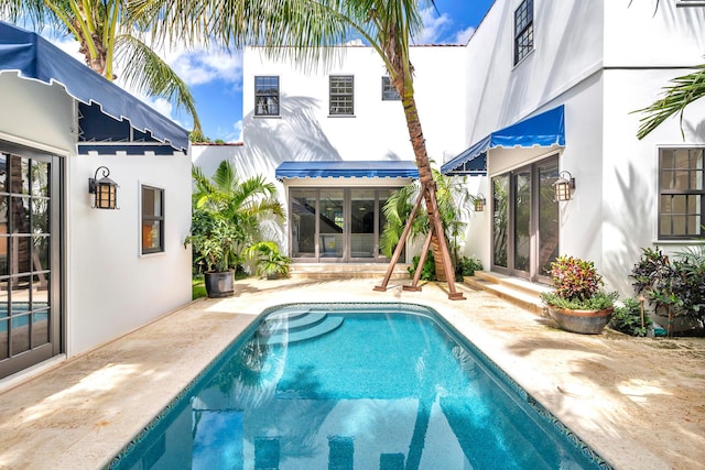 rear view of house with a patio area