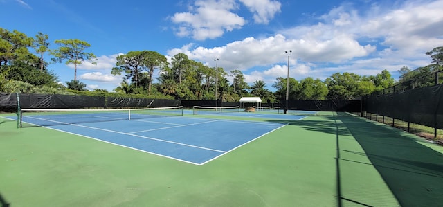 view of tennis court with basketball court