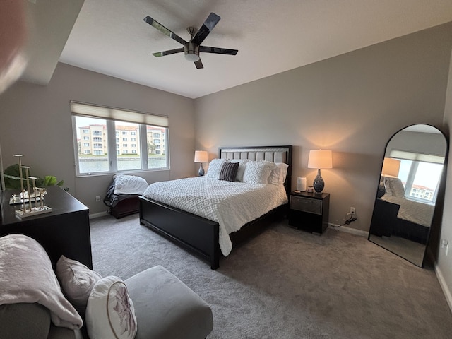 bedroom with ceiling fan and carpet