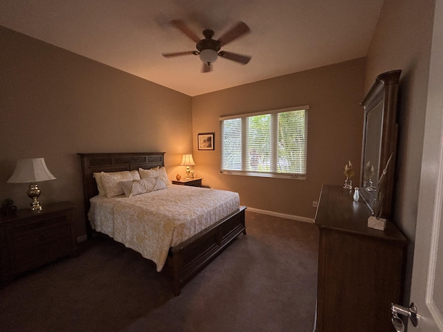 bedroom with dark carpet and ceiling fan