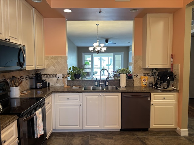 kitchen with sink, dishwasher, white cabinetry, hanging light fixtures, and electric range