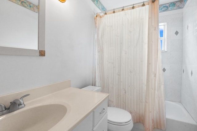 full bathroom featuring toilet, vanity, and shower / bath combo