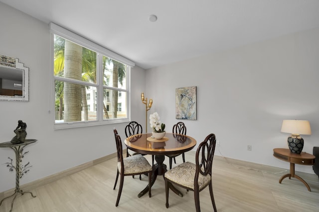 dining room with light hardwood / wood-style flooring