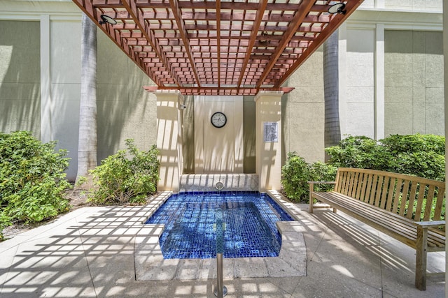 view of pool featuring a pergola and a patio