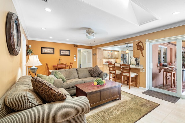 tiled living room featuring crown molding and ceiling fan