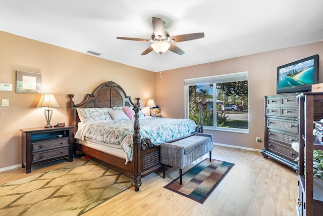 bedroom featuring ceiling fan and light wood-type flooring