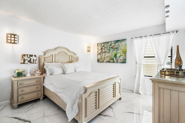 bedroom with a textured ceiling