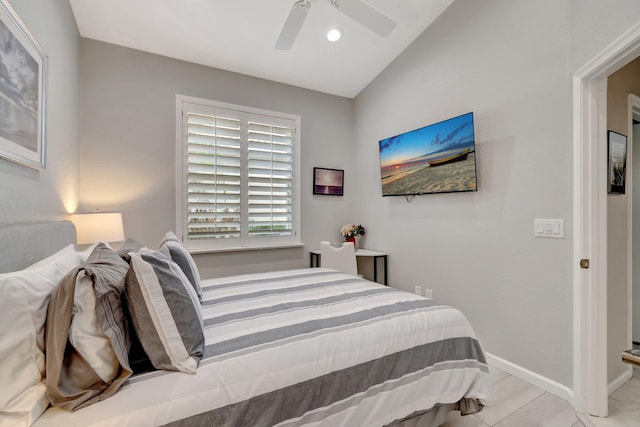 bedroom featuring ceiling fan and vaulted ceiling