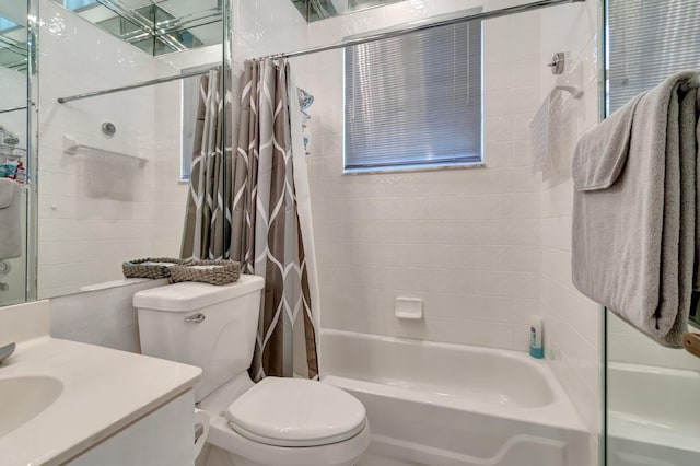 full bathroom with shower / bath combo, vanity, and toilet