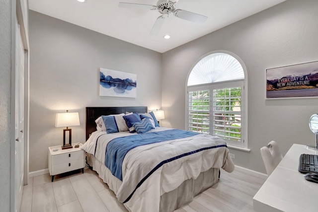 bedroom featuring ceiling fan and light wood-type flooring