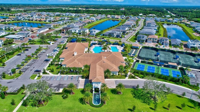 drone / aerial view with a water view