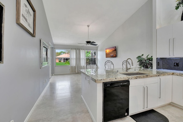 kitchen featuring kitchen peninsula, white cabinetry, sink, and black dishwasher