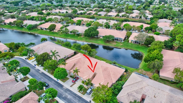 drone / aerial view featuring a water view