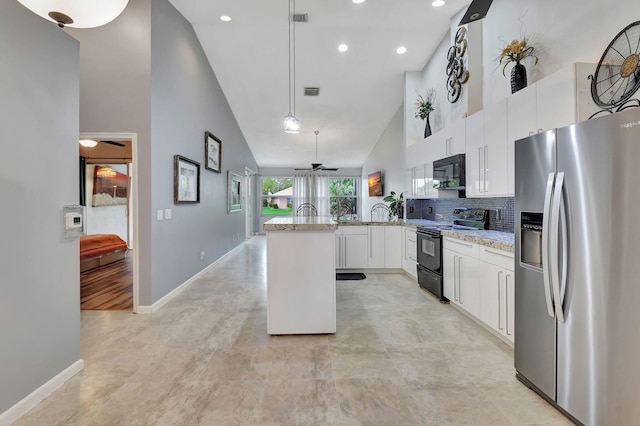 kitchen featuring light stone countertops, black appliances, high vaulted ceiling, white cabinets, and hanging light fixtures