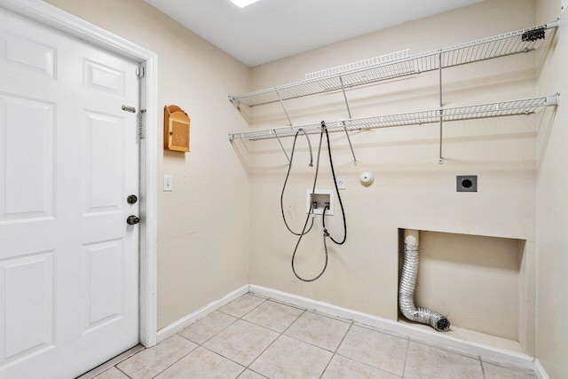 laundry area with hookup for a washing machine, tile patterned floors, gas dryer hookup, and electric dryer hookup