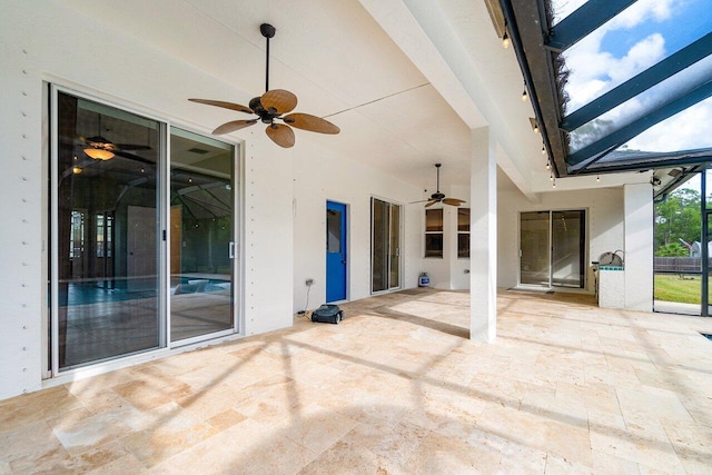 view of patio with ceiling fan