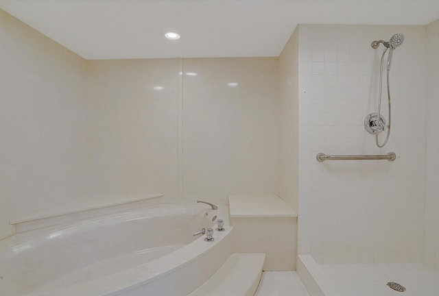 bathroom featuring separate shower and tub and tile patterned flooring