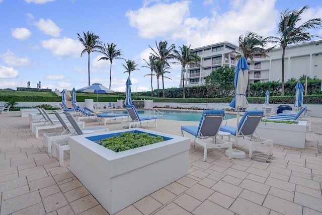 view of patio / terrace with a community pool