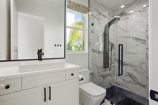 bathroom with plenty of natural light, a marble finish shower, and toilet