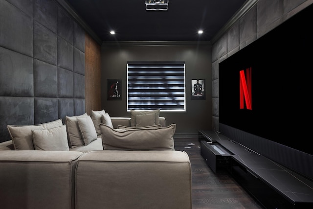 home theater with recessed lighting, dark wood finished floors, and crown molding