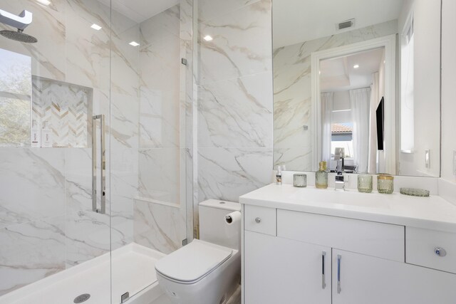 bathroom with crown molding, vanity, plus walk in shower, and a tray ceiling