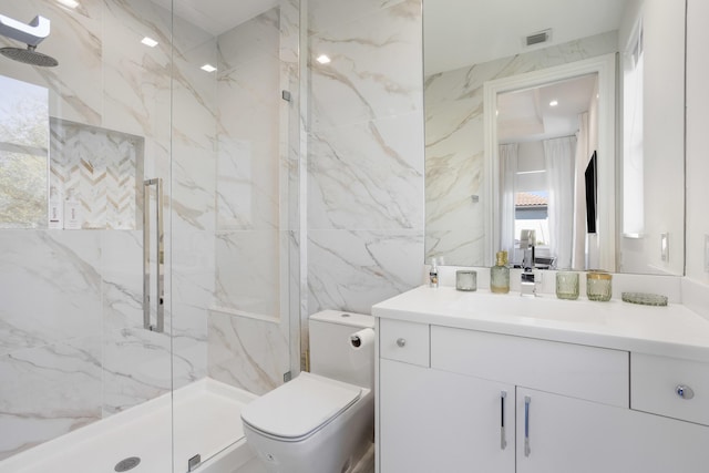 full bathroom with toilet, visible vents, vanity, tile walls, and a marble finish shower