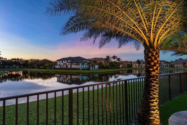 property view of water with fence