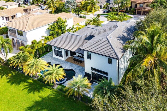 exterior space featuring a water view and a patio area