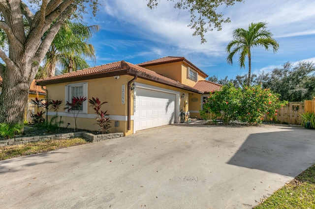 view of front of property featuring a garage