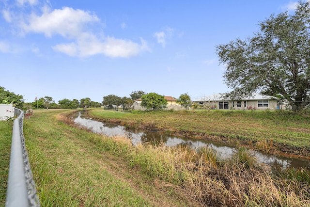 view of yard featuring a water view