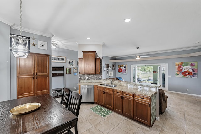 kitchen featuring kitchen peninsula, backsplash, stainless steel dishwasher, ceiling fan, and sink