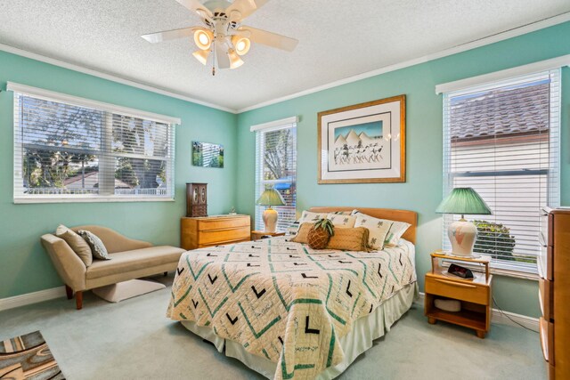 kitchen featuring white cabinets, sink, stainless steel dishwasher, ceiling fan, and decorative light fixtures