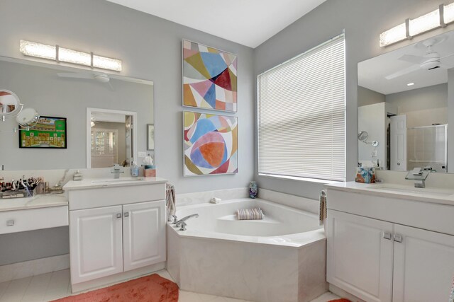 bathroom with ceiling fan, tile patterned flooring, vanity, and independent shower and bath