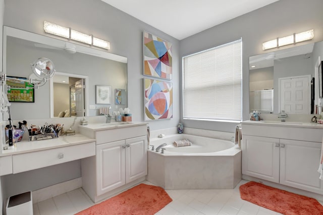 bathroom with tile patterned flooring, vanity, and independent shower and bath