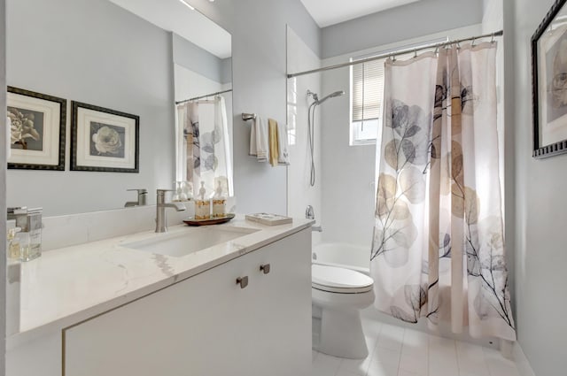 full bathroom featuring shower / bathtub combination with curtain, vanity, and toilet